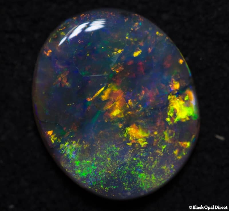 0.87 ct semi black opal 9x7.5x2mm