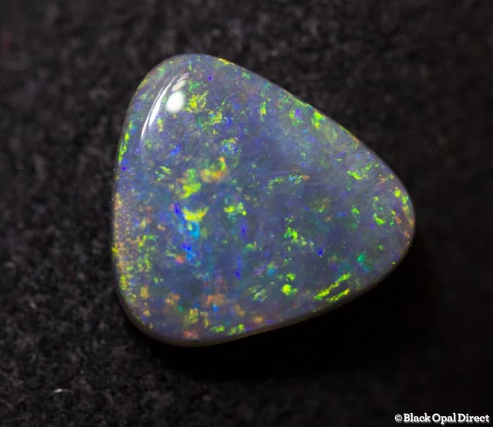 0.87 ct triangle shaped opal double sided 8x7x2mm