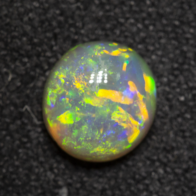 0.88 ct crystal opal 6.7x6.2x3.6mm
