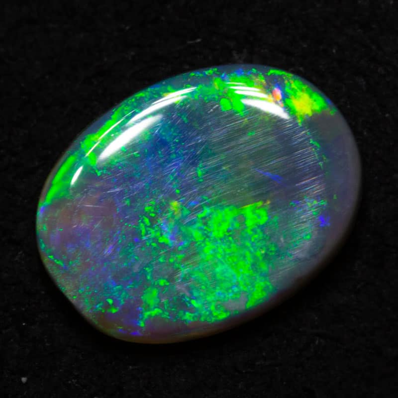 0.94 ct dark opal 8.6x6x2.7mm