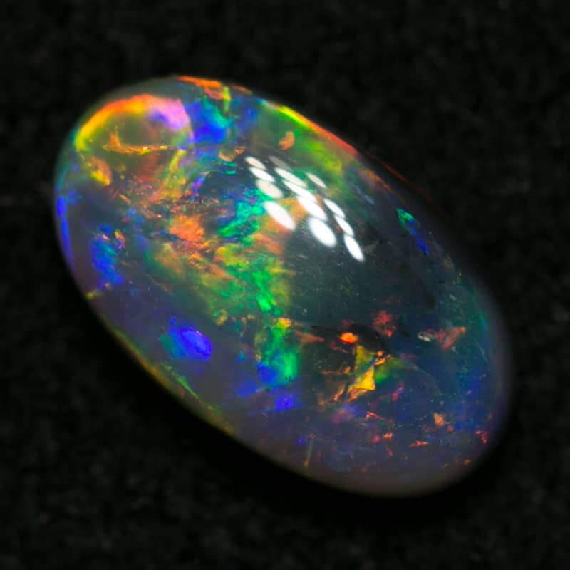 0.88 ct dark opal 8x5x3mm