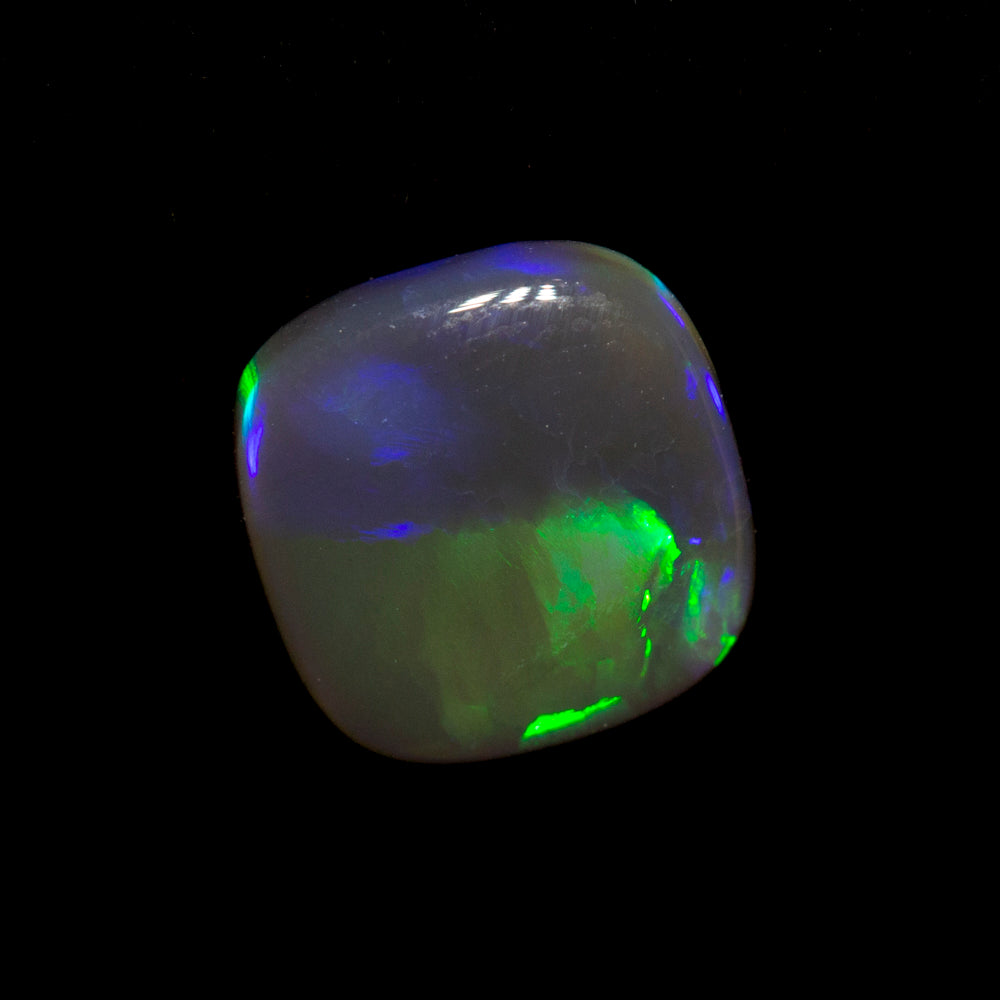 0.89 ct black crystal opal 6.9x6.9x2.5mm