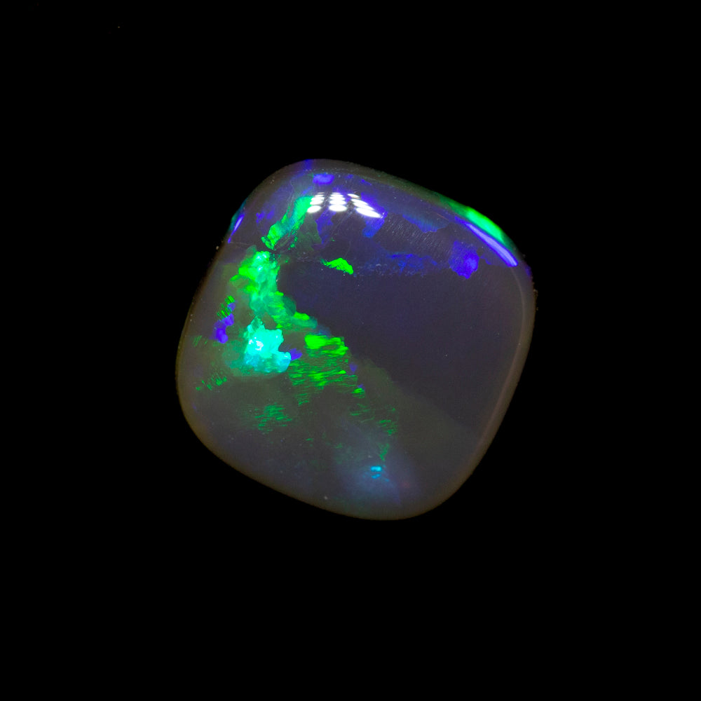 0.89 ct black crystal opal 6.9x6.9x2.5mm