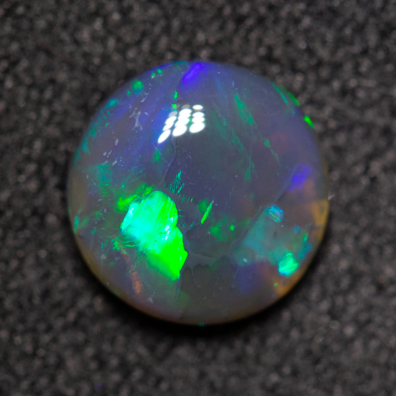 0.90 ct black opal 6.9x6.8x3.1mm