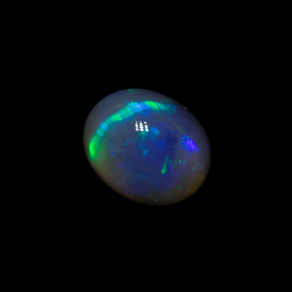0.90 ct black crystal opal 6.8x5.4x3.9mm