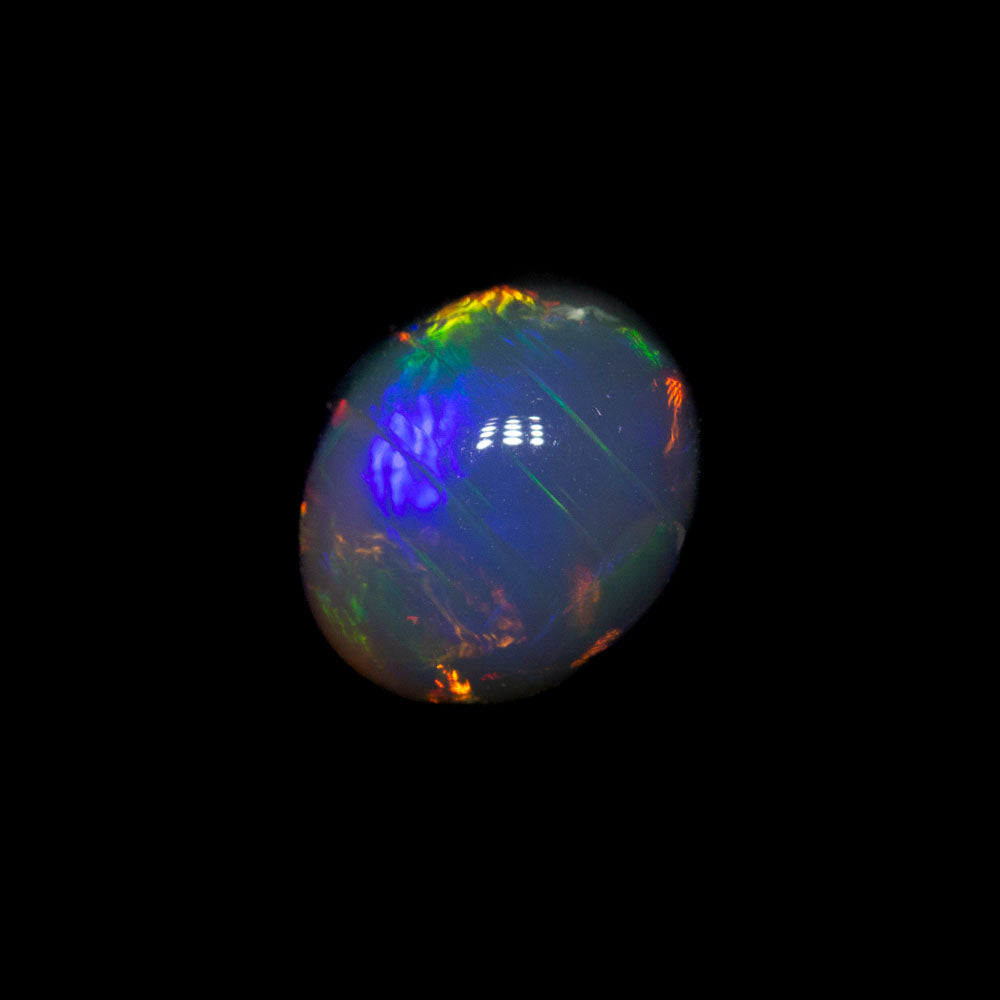 0.90 ct black opal 6.7x5.6x3.9mm