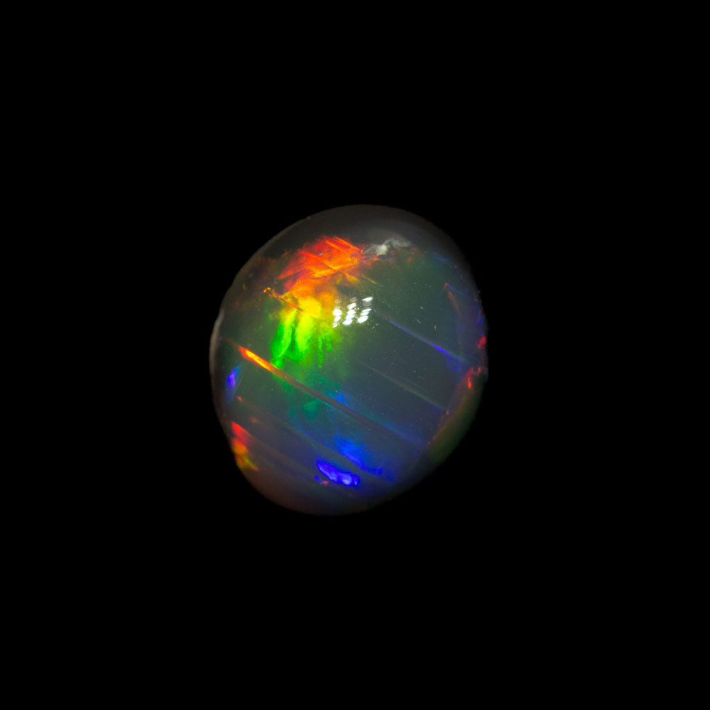 0.90 ct black opal 6.7x5.6x3.9mm