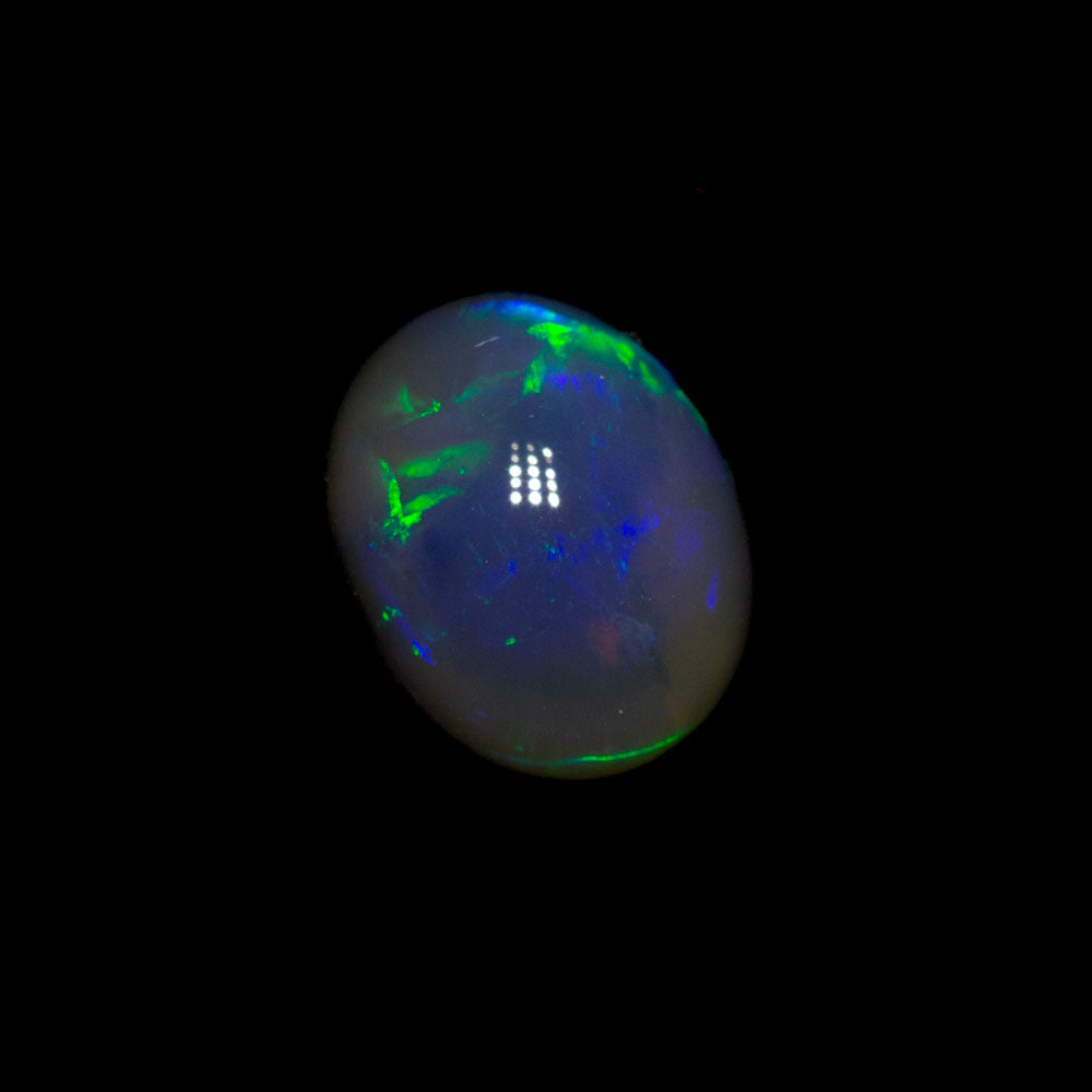 0.90 ct black crystal opal 6.8x5.4x3.9mm