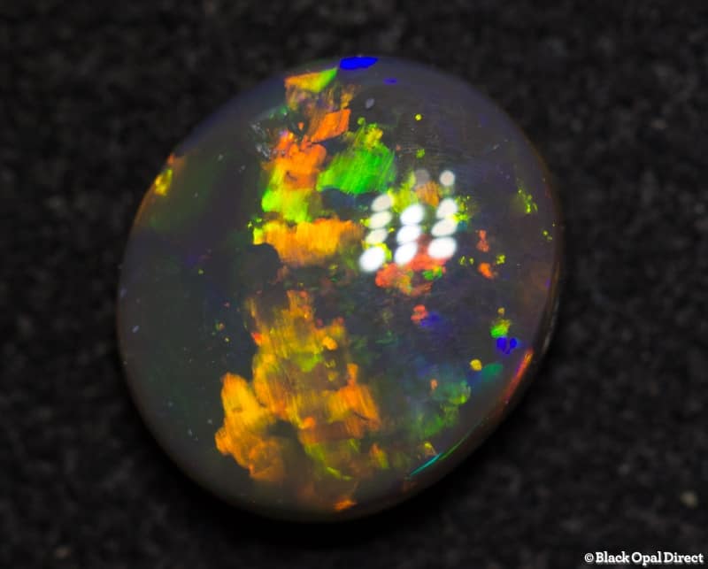 0.90 ct gem black opal 7.5x6.5x3mm