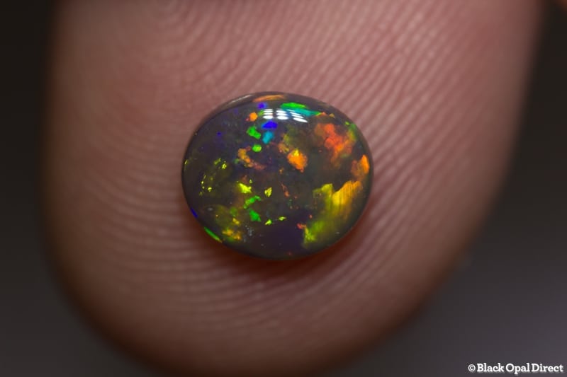 0.90 ct gem black opal 7.5x6.5x3mm