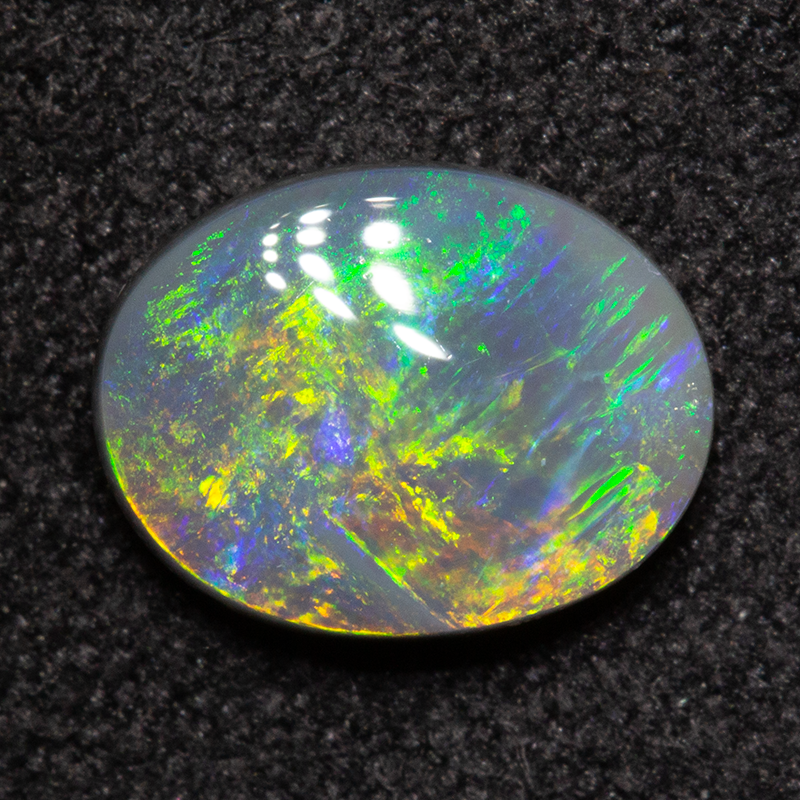 0.91 ct dark opal 8.2x6.4x2.6mm