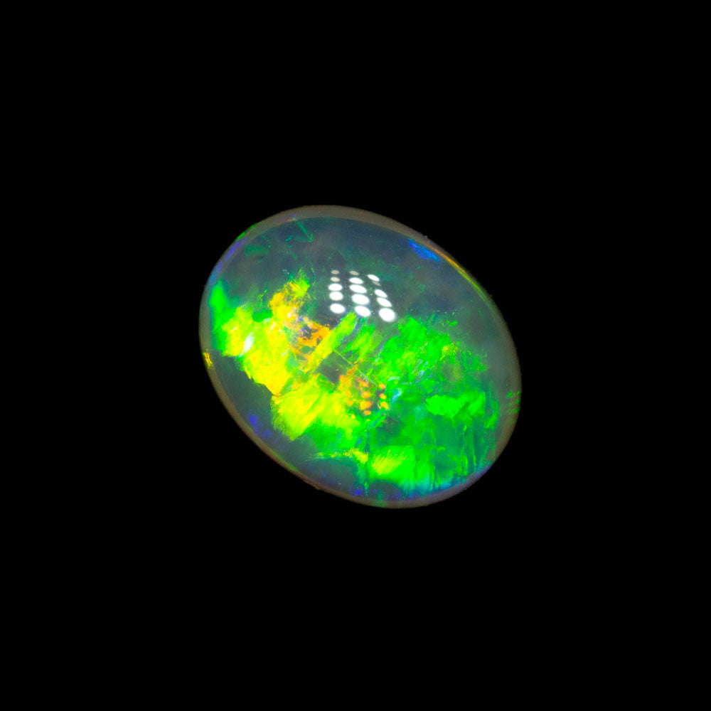 0.91 ct double-sided crystal opal 7.5x5.9x3.2mm