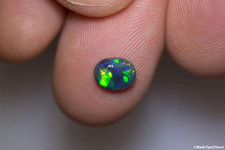 0.91 ct black opal 7.5x5.5x3mm