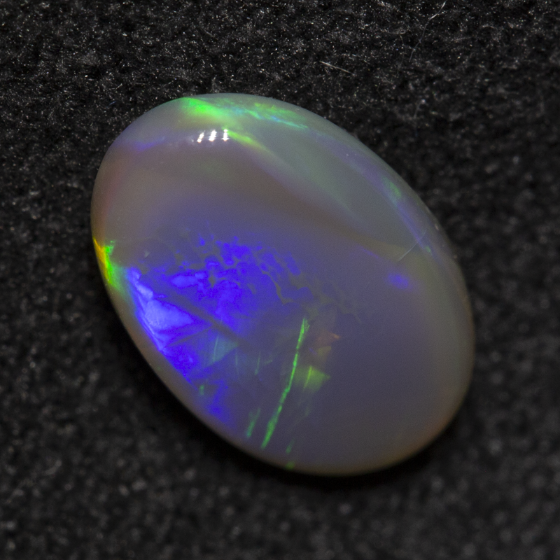 0.93 ct dark opal 9.1x5.9x2.6mm