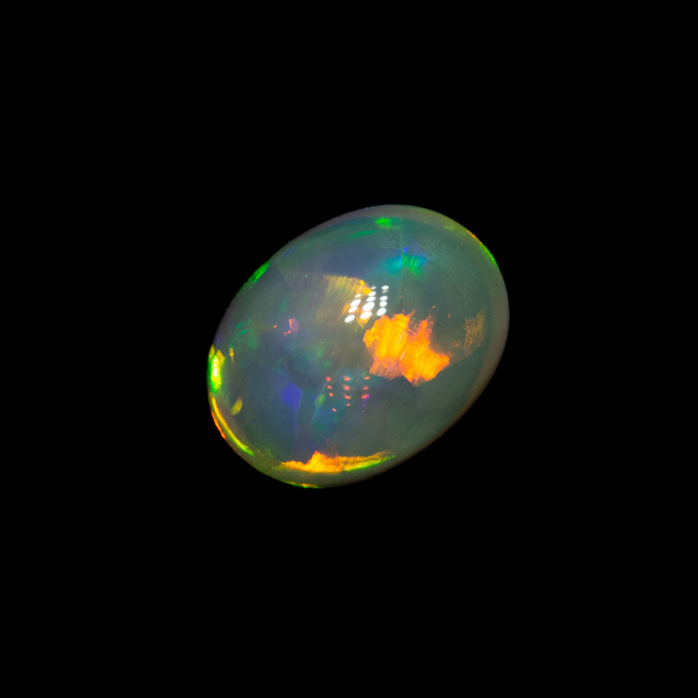 0.93 ct double-sided gem crystal opal 7.5x5.7x3.7mm