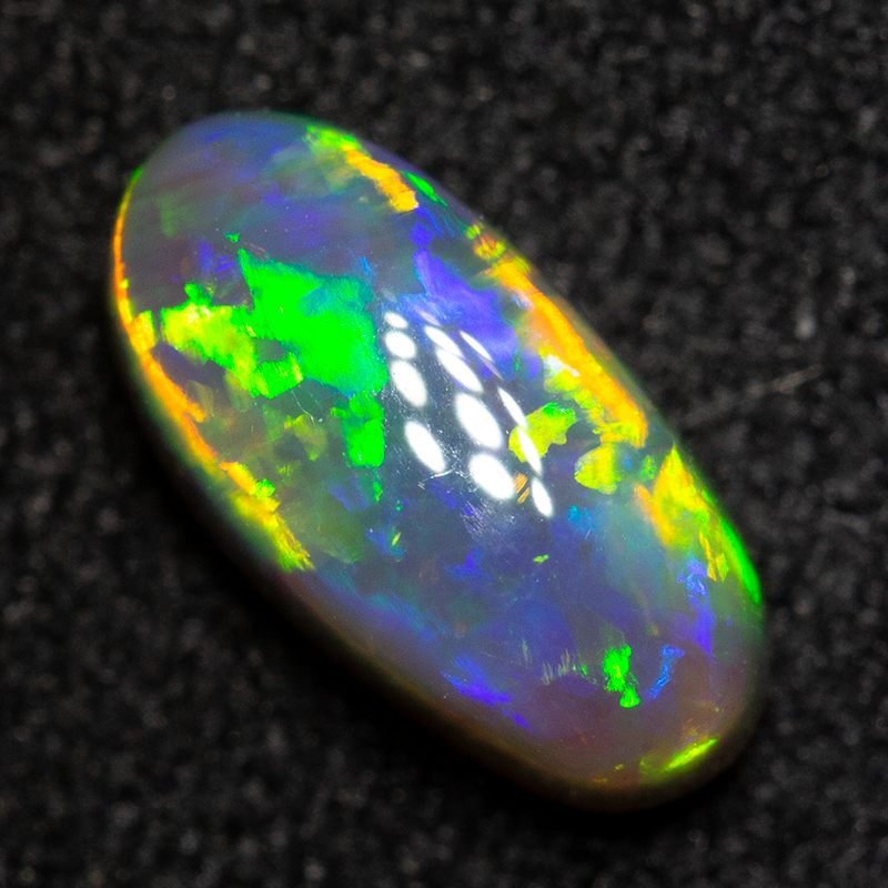 0.93 ct dark opal 8.7x4.4x3.8mm