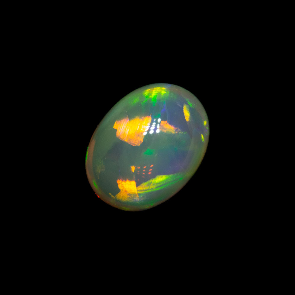 0.93 ct double-sided gem crystal opal 7.5x5.7x3.7mm
