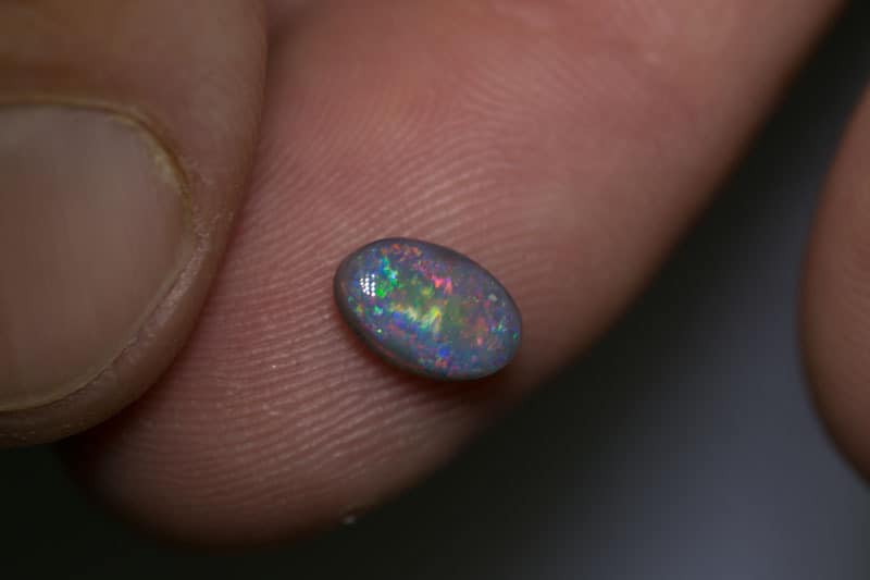 0.93 ct dark opal 8x5x3mm