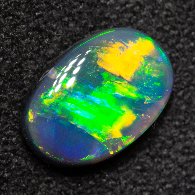 0.94 ct black opal 8x5.6x2.9mm