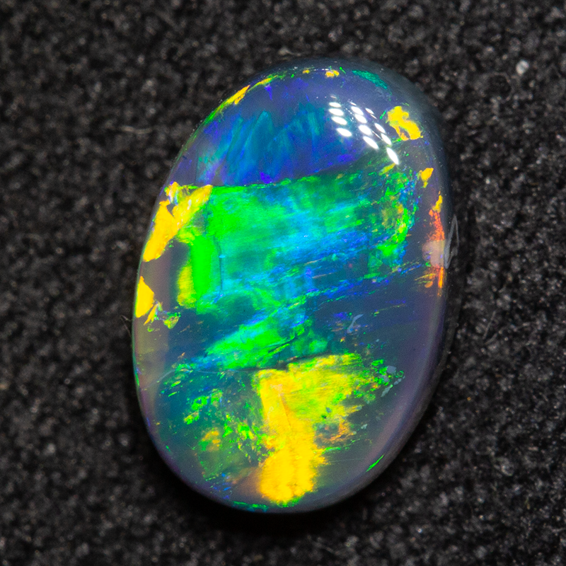 0.94 ct black opal 8x5.6x2.9mm
