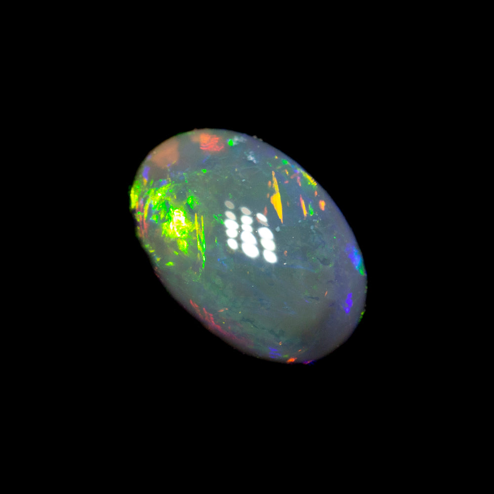 0.94 ct black opal 7.4x5.2x4mm