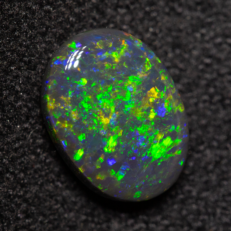 0.95 ct black opal 8x6x2.8mm