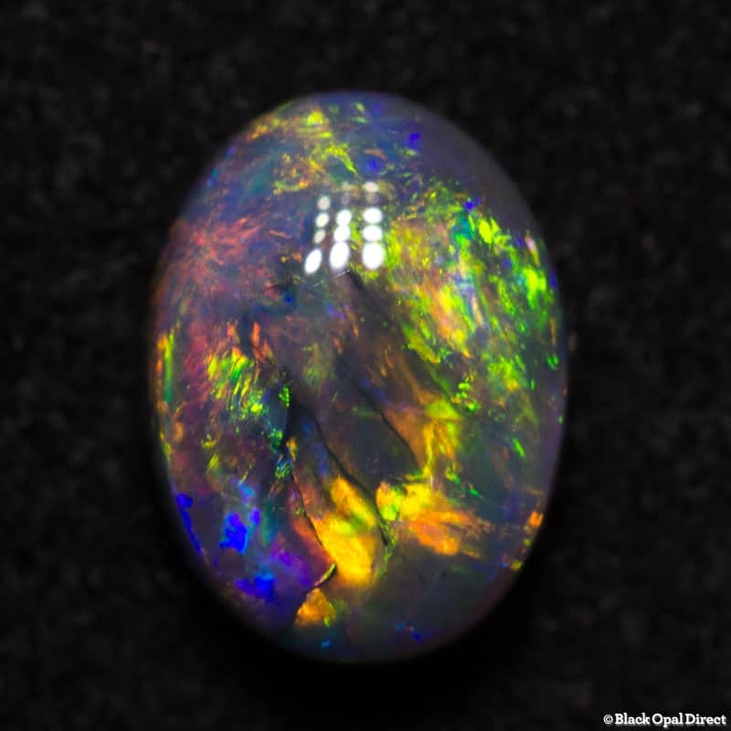 0.95 ct gem black opal 7.5x5.5x3.5mm