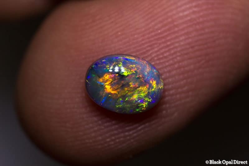 0.95 ct gem black opal 7.5x5.5x3.5mm