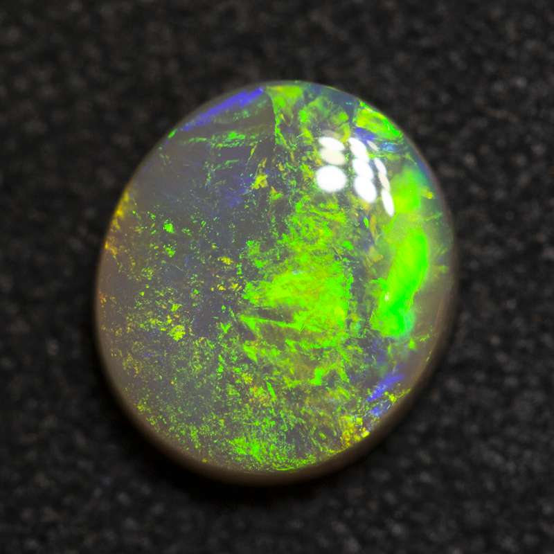 0.96 ct dark opal 7.3x6.5x2.8mm