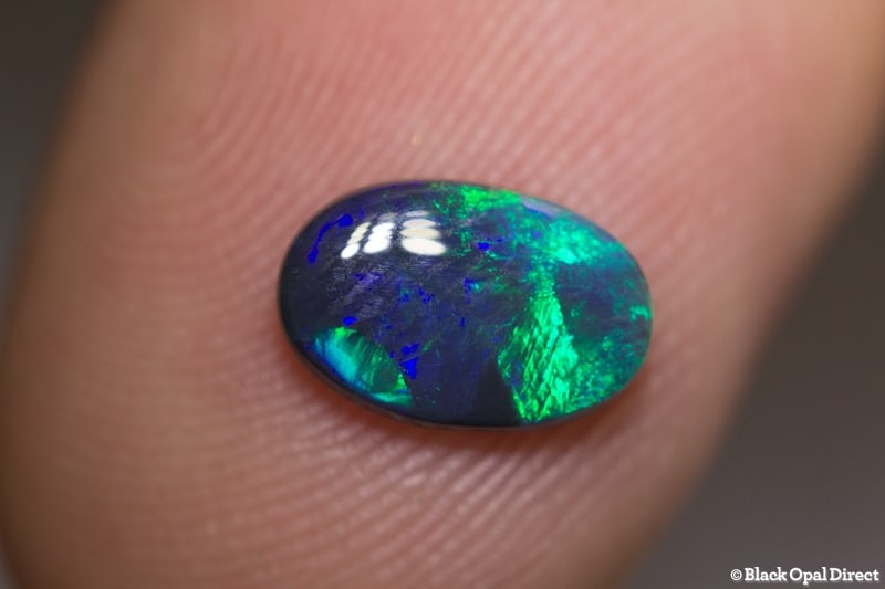 0.96 ct black opal 9x6x2mm