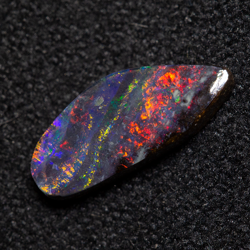 0.97 ct boulder opal 10x4.3x2.2mm
