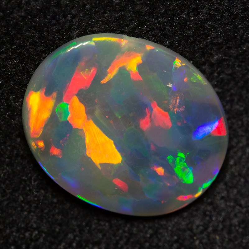 0.98 ct dark opal 10.2x8.4x1.7mm