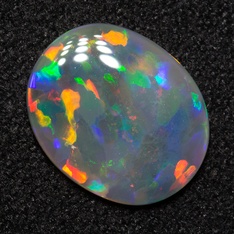 0.98 ct dark opal 10.2x8.4x1.7mm