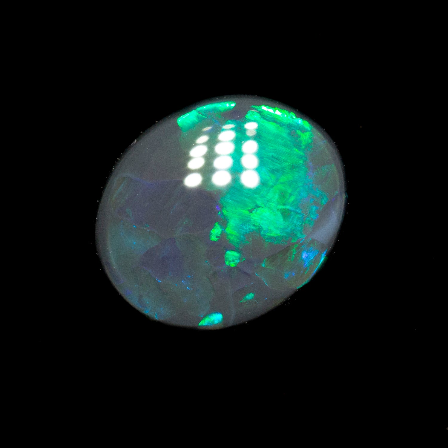 0.98 ct black opal 8.3x7x2.5mm