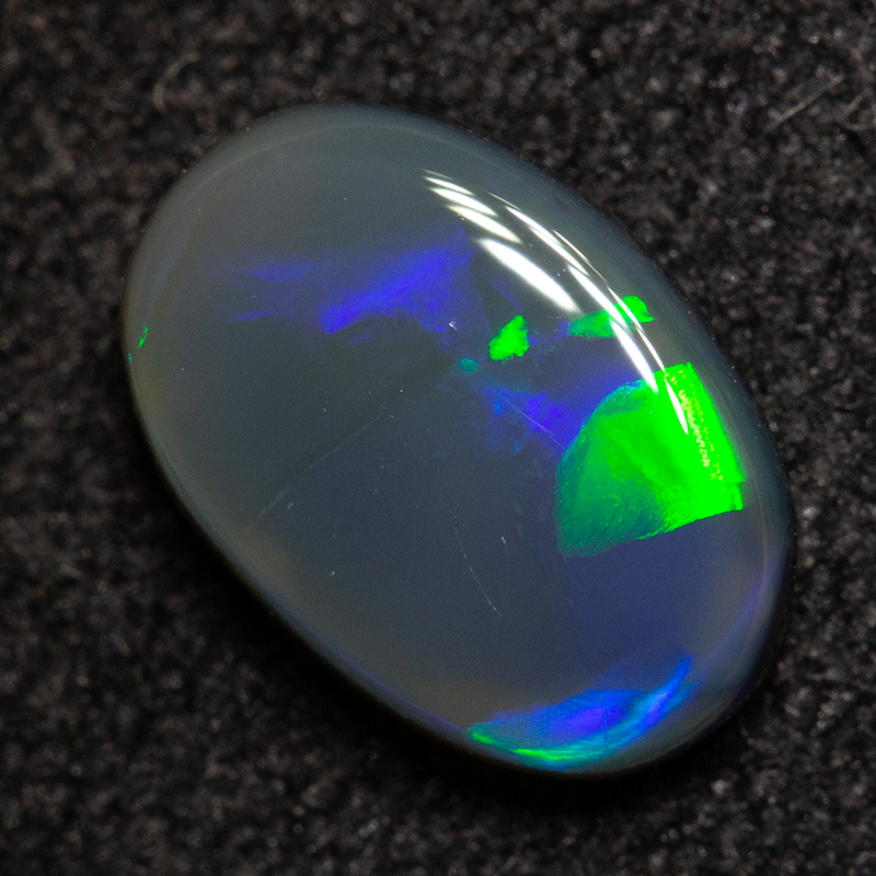 0.98 ct black opal 8.7x5.9x2.8mm