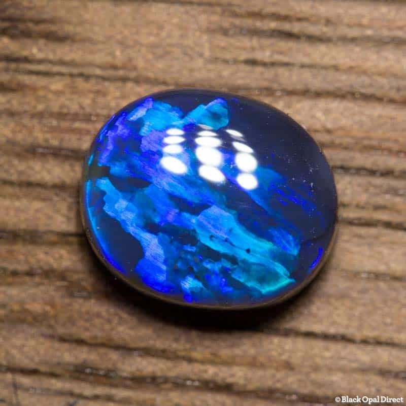 0.98 ct black opal with wedgtail pattern 7.2x6x3mm