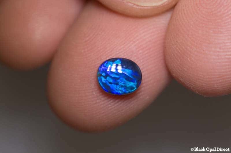 0.98 ct black opal with wedgtail pattern 7.2x6x3mm