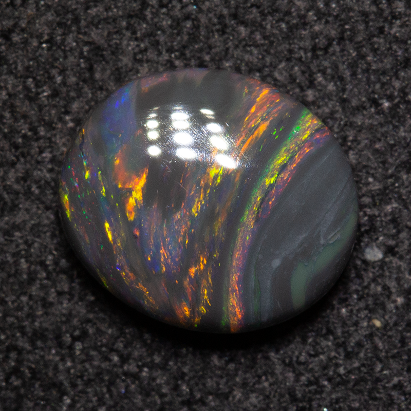 0.99 ct black opal 7.6x6.5x3mm