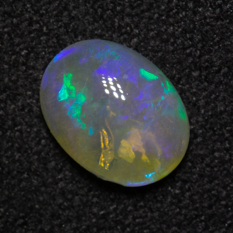 0.99 ct crystal opal 8x6.1x3.3mm