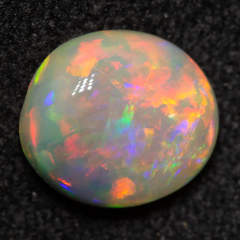 0.99 ct crystal opal 7.5x6.7x3.4mm