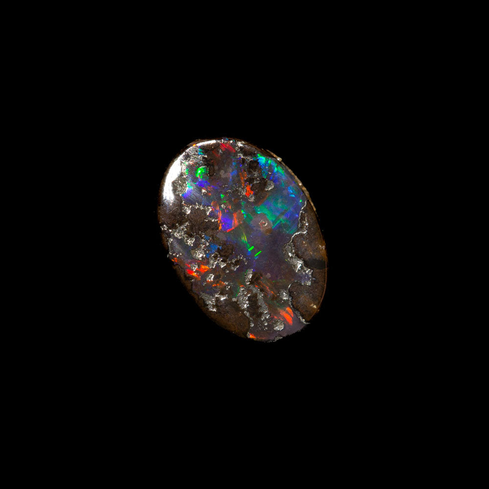 0.87 ct boulder opal 7.6x5.4x2.3mm