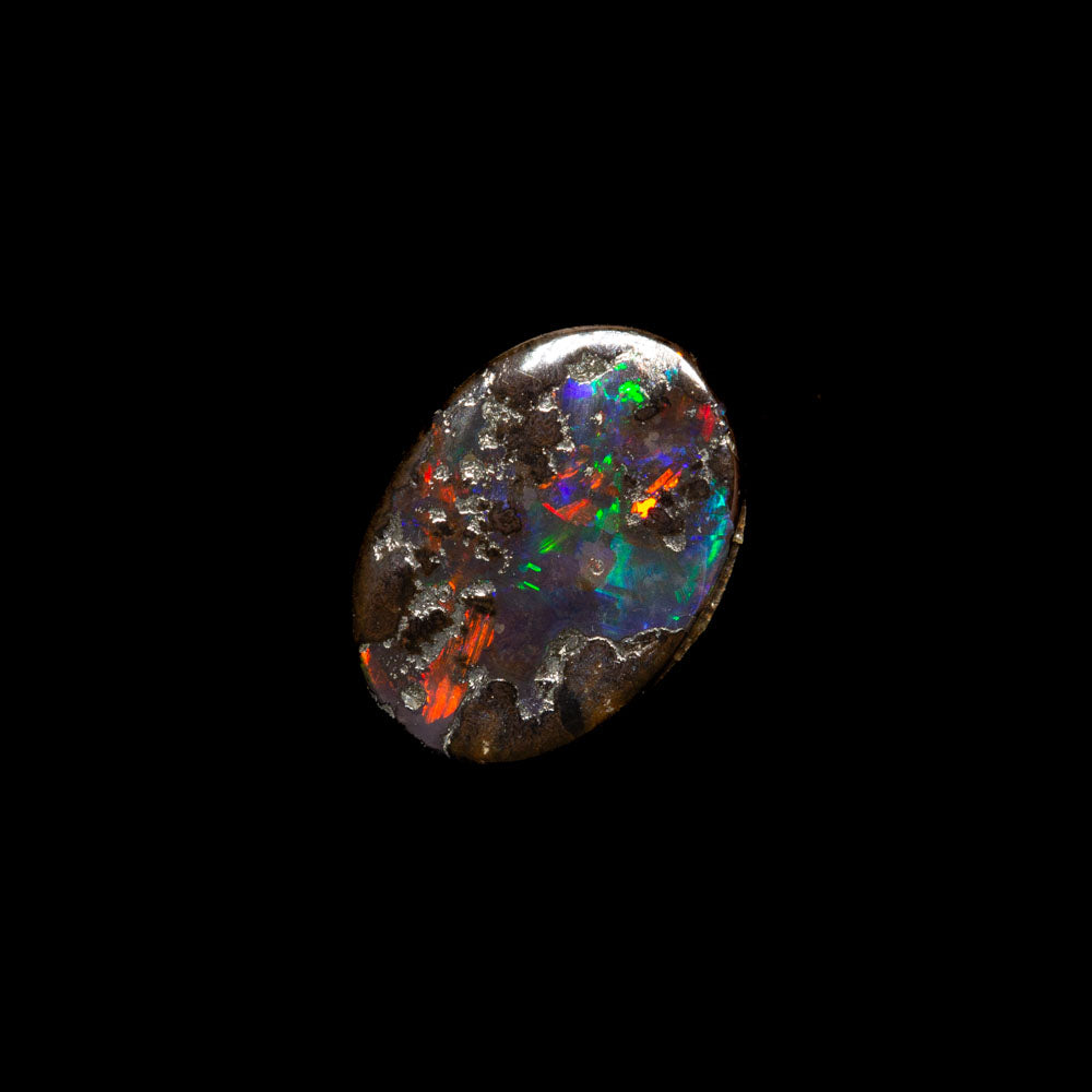 0.87 ct boulder opal 7.6x5.4x2.3mm