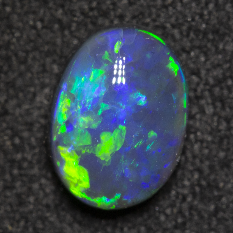 1.00 ct black opal 7.6x5.7x3.7mm
