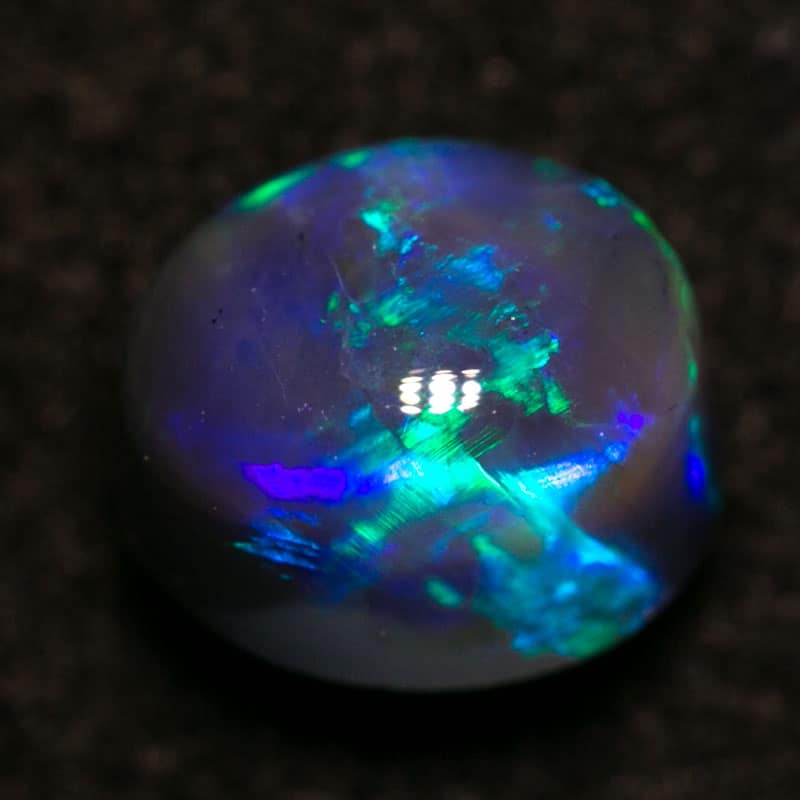 1.00 ct black opal 6.5x5x4.5mm