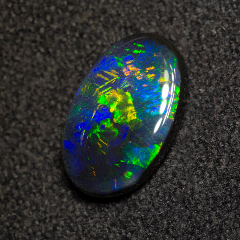 1.02 ct black opal 9.6x5.2x2.8mm