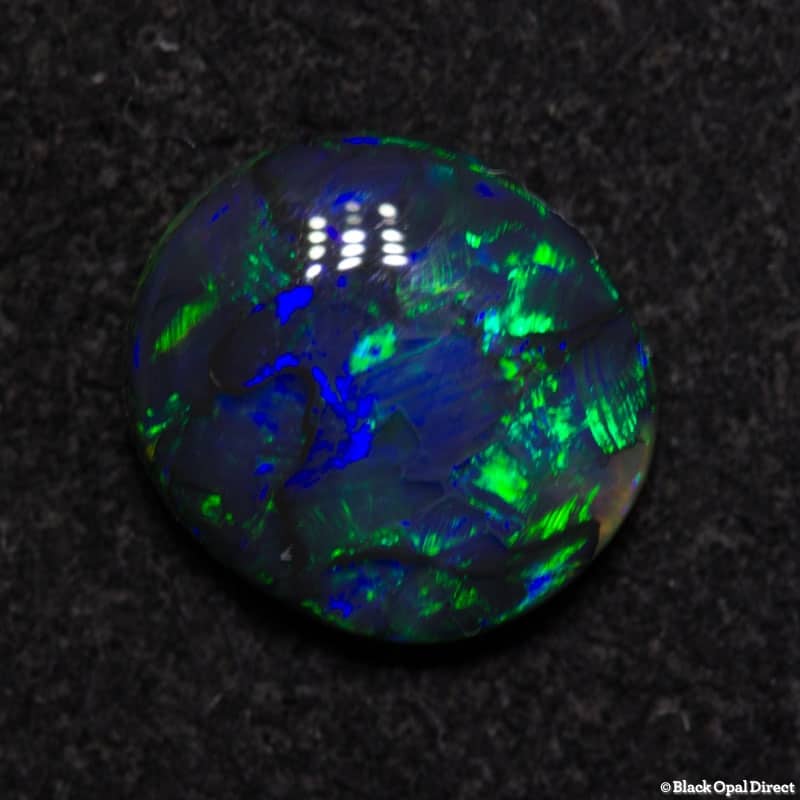 1.02 ct black opal 7.5x6.5x3.5mm