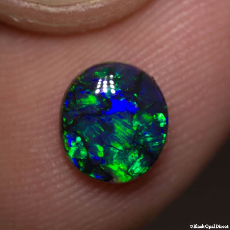 1.02 ct black opal 7.5x6.5x3.5mm