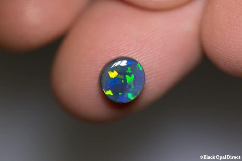 1.03 ct black opal 7.5x7x3mm