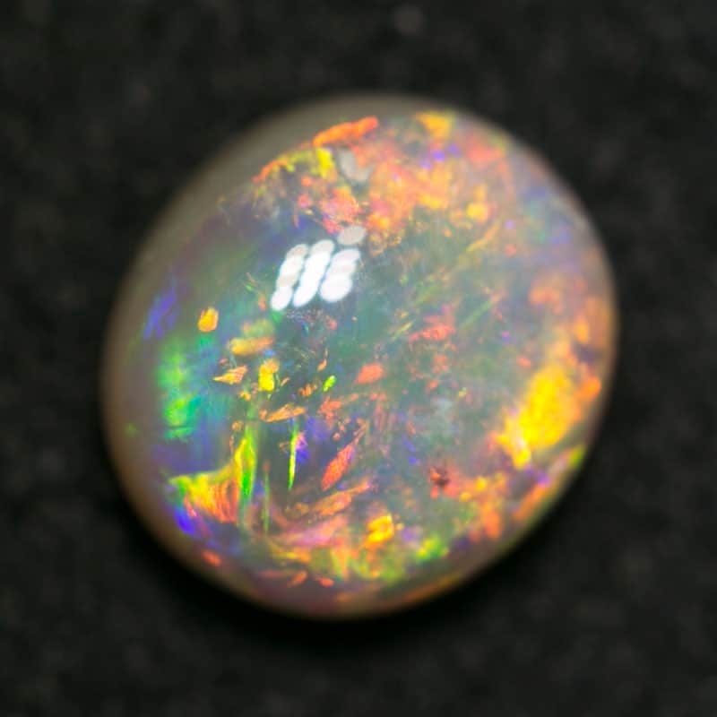 1.03 ct dark opal 7x6x3.5mm