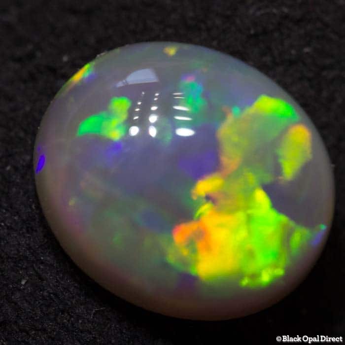 1.03 ct semi black opal 7x6x3mm